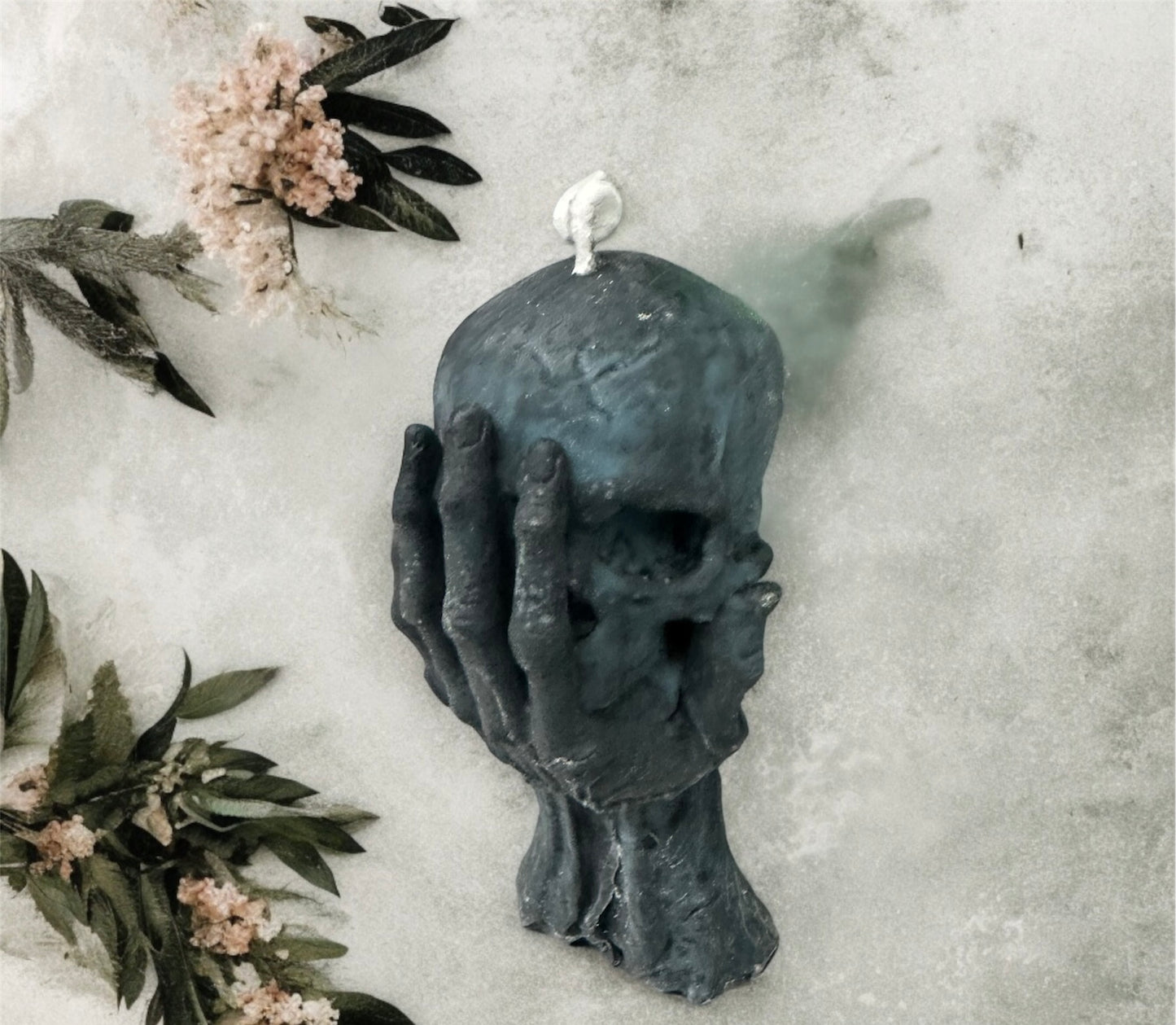 VELA CALAVERA EN MANO